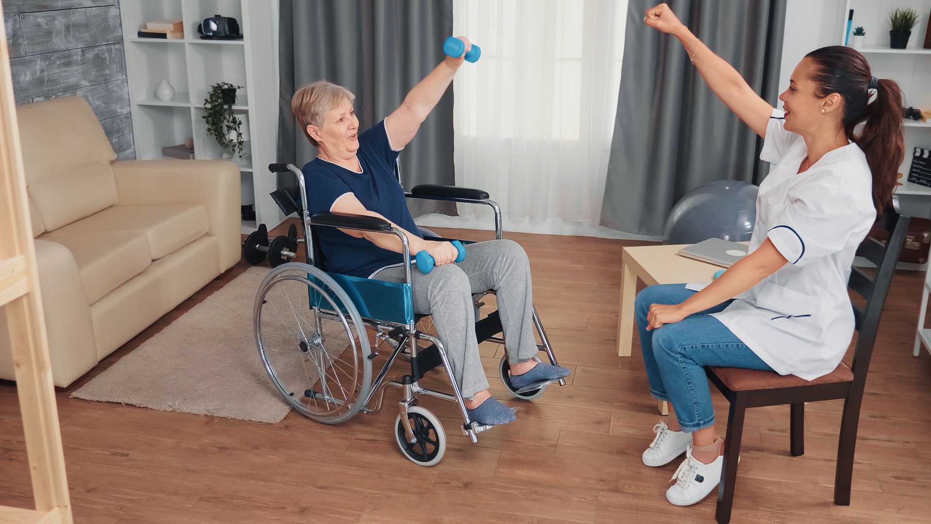 Rehabilitation treatment for woman in wheelchair